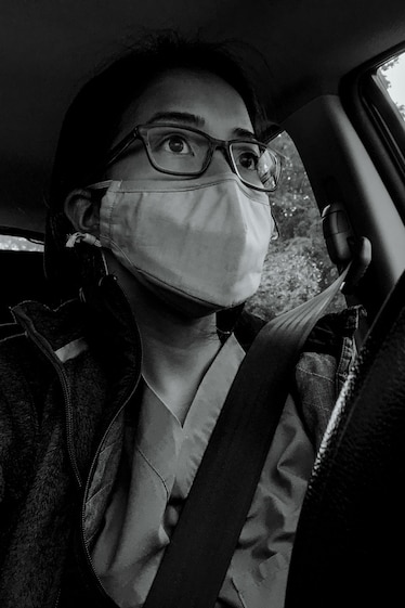 a nurse in her car
